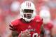 LOUISVILLE, KY - SEPTEMBER 02: Jeremy Wright #28 of the Louisville Cardinals runs for a touchdown during the game against the Kentucky Wildcats at Papa John's Cardinal Stadium on September 2, 2012 in Louisville, Kentucky. (Photo by Andy Lyons/Getty Images)