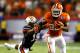 Auburn DB Ryan White (left) and Clemson RB Andre Ellington