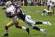 HOUSTON - AUGUST 18: Ted Ginn #19 of the San Francisco 49ers is tackled by Sherrick McManis #22 of the Houston Texans at Reliant Stadium on August 18, 2012 in Houston, Texas. (Photo by Bob Levey/Getty Images)