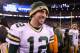 EAST RUTHERFORD, NJ - DECEMBER 04: Aaron Rodgers #12 of the Green Bay Packers celebrates after the Packers won 38-35 against the New York Giants at MetLife Stadium on December 4, 2011 in East Rutherford, New Jersey. (Photo by Al Bello/Getty Images)