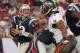August 24, 2012; Tampa, FL, USA; New England Patriots quarterback Tom Brady (12) drops back during the first quarter against the Tampa Bay Buccaneers at Raymond James Stadium. Mandatory Credit: Kim Klement-US PRESSWIRE