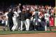 SAN FRANCISCO, CA - SEPTEMBER 03: The San Francisco Giants pile on top of Marco Scutaro #19 after he hit the game winning RBI single scoring Brandon Crawford #35 in the bottom of the tenth inning giving the San Francisco Giants a 9-8 win over the Arizona Diamondbacks at AT&T Park on September 3, 2012 in San Francisco, California. (Photo by Tony Medina/Getty Images)