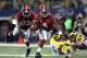 ARLINGTON, TX - SEPTEMBER 01: T.J. Yeldon #4 of the Alabama Crimson Tide runs the ball against Jake Ryan #90 of the Michigan Wolverines at Cowboys Stadium on September 1, 2012 in Arlington, Texas. (Photo by Ronald Martinez/Getty Images)