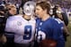 Jan 1, 2012; East Rutherford, NJ, USA; New York Giants quarterback Eli Manning (10) and Dallas Cowboys quarterback Tony Romo (9) meet on the field after their game at MetLife Stadium. Giants won 31-14. Mandatory Credit: Chris Faytok/The Star-Ledger via US PRESSWIRE