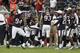HOUSTON, TX - AUGUST 30: Brandon Harris #26 of the Houston Texans celebrates with Antonio Smith #94 of the Houston Texans after making a big defensive stop against the Minnesota Vikings at Reliant Stadium on August 30, 2012 in Houston, Texas. Houston won 28-24. (Photo by Bob Levey/Getty Images)