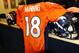 March 20 2012; Englewood, CO, USA; General view of the official jersey of Denver Broncos quarterback Peyton Manning (18) (not pictured) before the start of press conference at Broncos headquarters. Mandatory Credit: Ron Chenoy-US PRESSWIRE