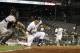 PITTSBURGH, PA - SEPTEMBER 5: Clint Barmes #12 of the Pittsburgh Pirates lays down a bunt, scoring Alex Presley #7 from third in the sixth inning against the Houston Astros during the game on September 5, 2012 at PNC Park in Pittsburgh, Pennsylvania. (Photo by Justin K. Aller/Getty Images)