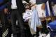 Mar 9, 2012; Minneapolis, MN, USA: Minnesota Timberwolves guard Ricky Rubio (9) sits on the bench after hurting his knee late in the fourth quarter against the Los Angeles Lakers at Target Center. The Lakers won 105-102. Mandatory Credit: Jesse Johnson-US PRESSWIRE