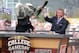 Sep 1, 2012; Arlington, TX, USA; ESPN analyst Lee Corso (left) wears the Alabama mascot head as analyst Kirk Herbstreit (right) laughs on the set of ESPN College Gameday before the game between the Alabama Crimson Tide and the Michigan Wolverines at Cowboys Stadium. Mandatory Credit: Kevin Jairaj-US PRESSWIRE