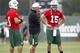 CORTLAND, NY - JULY 27: Matt Cavanaugh, quarterbacks coach of the New York Jets talks with Mark Sanchez #6 and Tim Tebow #15 of the New York Jets at Jets Training Camp at SUNY Cortland on July 27, 2012 in Cortland, New York. (Photo by Jeff Zelevansky/Getty Images)