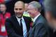 LONDON, ENGLAND - MAY 28: Josep Guardiola manager of FC Barcelona (L) greets Sir Alex Ferguson manager of Manchester United ahead of the UEFA Champions League final between FC Barcelona and Manchester United FC at Wembley Stadium on May 28, 2011 in London, England. (Photo by Shaun Botterill/Getty Images)