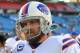 Nov 6, 2011; Orchard Park, NY, USA; Buffalo Bills quarterback Ryan Fitzpatrick (14) leaves the field after being beat by the New York Jets at Ralph Wilson Stadium. Jets beat the Bills 27-11. Mandatory Credit: Kevin Hoffman-US PRESSWIRE