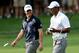 CARMEL, IN - SEPTEMBER 07: (L-R) Rory McIlroy of Northern Ireland and Tiger Woods walk up the second hole fairway during the second round of the BMW Championship at Crooked Stick Golf Club on September 7, 2012 in Carmel, Indiana. (Photo by Warren Little/Getty Images)