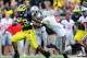 Nov 26, 2011; Ann Arbor, MI, USA; Michigan Wolverines running back Fitzgerald Toussaint (28) runs the ball during the fourth quarter against the Ohio State Buckeyes at Michigan Stadium. Mandatory Credit: Andrew Weber-US PRESSWIRE