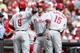 CINCINNATI, OH - SEPTEMBER 5: Erik Kratz #31 of the Philadelphia Phillies celebrates with Domonic Brown #9 and John Mayberry Jr. #15 after hitting a three-run home run in the second inning of the game against the Cincinnati Reds at Great American Ball Park on September 5, 2012 in Cincinnati, Ohio. (Photo by Joe Robbins/Getty Images)