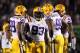 OXFORD, MS - NOVEMBER 19: Sam Montgomery #99, Bennie Logan #93, Michael Brockers #90 and Kendrick Adams #94 of the LSU Tigers huddle up against the Ole Miss Rebels on November 19, 2011 at Vaught-Hemingway Stadium in Oxford, Mississippi. LSU beat Mississippi 52-3. (Photo by Joe Murphy/Getty Images)