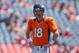 DENVER, CO - AUGUST 26: Quarterback Peyton Manning #18 of the Denver Broncos warms up before a pre-season game against the San Francisco 49ers at Sports Authority Field Field at Mile High on August 26, 2012 in Denver, Colorado. (Photo by Justin Edmonds/Getty Images)