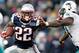 FOXBORO, MA - DECEMBER 24: Stevan Ridley #22 of the New England Patriots stiff arms Cameron Wake #91 of the Miami Dolphins during the fourth quarter of New England's 27-24 win at Gillette Stadium on December 24, 2011 in Foxboro, Massachusetts. (Photo by Winslow Townson/Getty Images)