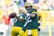 Aug 30, 2012; Green Bay, WI, USA; Green Bay Packers quarterback Aaron Rodgers (12) throws a pass during warmups prior to the game against the Kansas City Chiefs at Lambeau Field. Mandatory Credit: Jeff Hanisch-US PRESSWIRE