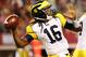Sep 1, 2012; Arlington, TX, USA; Michigan Wolverines quarterback Denard Robinson (16) throws a pass during the game against the Alabama Crimson Tide at Cowboys Stadium. Alabama won 41-14. Mandatory Credit: Kevin Jairaj-US PRESSWIRE