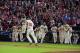 ATLANTA, GA - SEPTEMBER 2: Teammates celebrate as Chipper Jones #10 of the Atlanta Braves runs the bases after hitting a three-run walk-off home run against the Philadelphia Phillies at Turner Field on September 2 2012 in Atlanta, Georgia. (Photo by Scott Cunningham/Getty Images)