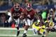 ARLINGTON, TX - SEPTEMBER 01: T.J. Yeldon #4 of the Alabama Crimson Tide runs the ball against Jake Ryan #90 of the Michigan Wolverines at Cowboys Stadium on September 1, 2012 in Arlington, Texas. (Photo by Ronald Martinez/Getty Images)