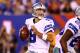 EAST RUTHERFORD, NJ - SEPTEMBER 05: quarterback Tony Romo #9 of the Dallas Cowboys drops back to pass as running back DeMarco Murray #29 blocks against the New York Giants during the 2012 NFL season opener at MetLife Stadium on September 5, 2012 in East Rutherford, New Jersey. (Photo by Al Bello/Getty Images)