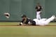 PITTSBURGH, PA - SEPTEMBER 7: The glove of Josh Harrison #5 of the Pittsburgh Pirates flies off against the Chicago Cubs during the game on September 7, 2012 at PNC Park in Pittsburgh, Pennsylvania. (Photo by Justin K. Aller/Getty Images)