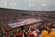 SAN FRANCISCO, CA - JANUARY 22: An American flag is opened on the field before the start of the NFC Championship Game against the San Francisco 49ers at Candlestick Park on January 22, 2012 in San Francisco, California. (Photo by Justin Sullivan/Getty Images)