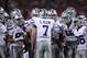 ARLINGTON, TX - JANUARY 06: Collin Klein #7 of the Kansas State Wildcats huddles the offense against the Arkansas Razorbacks during the Cotton Bowl at Cowboys Stadium on January 6, 2012 in Arlington, Texas. (Photo by Ronald Martinez/Getty Images)