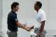 CARMEL, IN - SEPTEMBER 07: Rory McIlroy of Northern Ireland (L) shakes hands with Tiger Woods on the 18th green during the second round of the BMW Championship at Crooked Stick Golf Club on September 7, 2012 in Carmel, Indiana. (Photo by Warren Little/Getty Images)