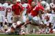 COLUMBUS, OH - SEPTEMBER 1: Braxton Miller #5 of the Ohio State Buckeyes is tripped up by Luke Kelly #36 of the Miami Redhawks during the third quarter on September 1, 2012 at Ohio Stadium in Columbus, Ohio. Ohio State defeated Miami 56-10. (Photo by Kirk Irwin/Getty Images)