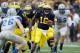 ANN ARBOR, MI - SEPTEMBER 08: Denard Robinson #16 of the Michigan Wolverines runs for a third quarter touchdown while playing the Air Force Falcons at Michigan Stadium on September 8, 2012 in Ann Arbor, Michigan. (Photo by Gregory Shamus/Getty Images)