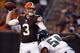 CLEVELAND, OH - AUGUST 24: Quarterback Brandon Weeden #3 of the Cleveland Browns throws to a receiver as he is pressured by defensive end Brandon Graham #54 of the Philadelphia Eagles at Cleveland Browns Stadium on August 24, 2012 in Cleveland, Ohio. (Photo by Matt Sullivan/Getty Images)