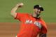 MIAMI, FL - JULY 15: Heath Bell #21 of the Miami Marlins delivers a pitch against the Washington Nationals at Marlins Park on July 15, 2012 in Miami, Florida. (Photo by Chris Trotman/Getty Images)