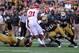 September 8, 2012; Iowa City, IA, USA; Iowa State Cyclones running back Shontrelle Johnson (21) is tackled by Iowa Hawkeyes player Christian Kirksey (20) in the fourth quarter at Kinnick Stadium. The Cyclones defeated the Hawkeyes 9-6. Mandatory Credit: Reese Strickland-US PRESSWIRE