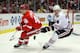 DETROIT, MI - MARCH 4: Cory Emmerton #48 of the Detroit Red Wings battles for the puck with Dylan Olsen #34 of the Chicago Blackhawks during their NHL game at Joe Louis Arena on March 4, 2012 in Detroit, Michigan. (Photo by Dave Sandford/Getty Images)