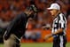 DENVER, CO - SEPTEMBER 09: Head coach Mike Tomlin of the Pittsburgh Steelers protests a call with umpire Gerald Wright on a pass reception by wide receiver Eric Decker #87 of the Denver Broncos in the fourth quarter at Sports Authority Field at Mile High on September 9, 2012 in Denver, Colorado. The Broncos defeated the Steelers 31-19. (Photo by Doug Pensinger/Getty Images)