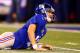 EAST RUTHERFORD, NJ - SEPTEMBER 05: Quarterback Eli Manning #10 of the New York Giants looks on after getting knocked down against the Dallas Cowboys during the 2012 NFL season opener at MetLife Stadium on September 5, 2012 in East Rutherford, New Jersey. (Photo by Al Bello/Getty Images)
