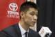 HOUSTON, TX - JULY 19: Jeremy Lin of the Houston Rockets speaks to the media as he is introduced during a press conference at Toyota Center on July 19, 2012 in Houston, Texas. Lin has signed a three year $25 million dollar contract with the Houston Rockets. (Photo by Bob Levey/Getty Images)