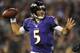 BALTIMORE, MD - AUGUST 23: Quarterback Joe Flacco #5 of the Baltimore Ravens looks for an open receiver against the Jacksonville Jaguars during the preseason game at M&T Bank Stadium on August 23, 2012 in Baltimore, Maryland. The Baltimore Ravens won 48-17. (Photo by Patrick Smith/Getty Images)