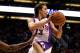PHOENIX - MAY 18: Steve Nash #13 of the Phoenix Suns passes the ball back out for an assist against the Dallas Mavericks in Game five of the Western Conference Semifinals during the 2005 NBA Playoffs at America West Arena on May 18, 2005 in Phoenix, Arizona. NOTE TO USER: User expressly acknowledges and agrees that, by downloading and or using this photograph, User is consenting to the terms and conditions of the Getty Images License Agreement. (Photo by Stephen Dunn/Getty Images)