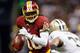 NEW ORLEANS, LA - SEPTEMBER 09: Robert Griffin III #10 of the Washington Redskins tries to avoid a tackle by Johnny Patrick #32 of the New Orleans Saints at Mercedes-Benz Superdome on September 9, 2012 in New Orleans, Louisiana. (Photo by Chris Graythen/Getty Images)