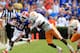 GAINESVILLE, FL - SEPTEMBER 17: Running back Jeff Demps #28 of the Florida Gators attempts tu run past defensive back Prentiss Waggner #23 of the Tennessee Volunteers during a game at Ben Hill Griffin Stadium on September 17, 2011 in Gainesville, Florida. (Photo by Sam Greenwood/Getty Images)