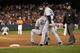 BALTIMORE, MD - SEPTEMBER 08: First base umpire Jerry Meals walks away after calling Mark Teixeira #25 of the New York Yankees out for the last out of the game during the Yankees 5-4 loss to the Baltimore Orioles at Oriole Park at Camden Yards on September 8, 2012 in Baltimore, Maryland. At right is first base coach Mick Kelleher. (Photo by Rob Carr/Getty Images)