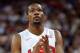 LONDON, ENGLAND - AUGUST 12: Kevin Durant #5 of the United States looks on during the Men's Basketball gold medal game between the United States and Spain on Day 16 of the London 2012 Olympics Games at North Greenwich Arena on August 12, 2012 in London, England. (Photo by Harry How/Getty Images)