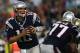 FOXBORO, MA - AUGUST 9: Tom Brady #12 of the New England Patriots looks for an open man against the New Orleans Saints in the first half at Gillette Stadium on August 9, 2012 in Foxboro, Massachusetts. (Photo by Jim Rogash/Getty Images)