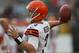 GREEN BAY, WI - AUGUST 16: Brandon Weeden #3 of the Cleveland Browns participates in warm-ups before a preseason game against the Green Bay Packers at Lambeau Field on August 16, 2012 in Green Bay, Wisconsin. The Browns defeated the Packers 35-10. (Photo by Jonathan Daniel/Getty Images)