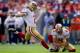 DENVER, CO - AUGUST 26: Place kicker David Akers #2 of the San Francisco 49ers makes a 32-yard field goal on a hold by punter Andy Lee #4 during the fourth quarter of a pre-season game against the Denver Broncos at Sports Authority Field Field at Mile High on August 26, 2012 in Denver, Colorado. The 49ers defeated the Broncos, 29-24. (Photo by Justin Edmonds/Getty Images)