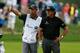 CARMEL, IN - SEPTEMBER 09: Phil Mickelson and his caddie Jim Mackay (L) look on from the 15th hole fairway during the final round of the BMW Championship at Crooked Stick Golf Club on September 9, 2012 in Carmel, Indiana. (Photo by Scott Halleran/Getty Images)